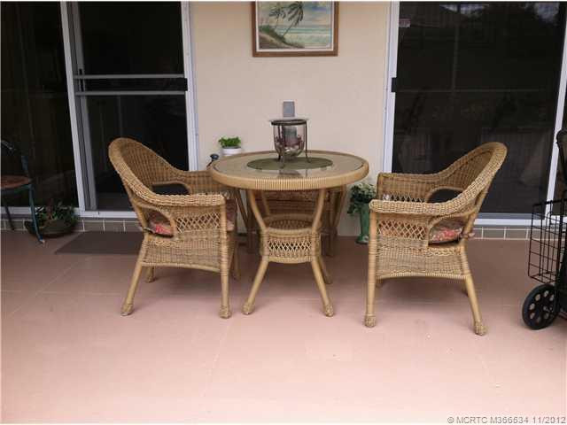 Exterior Front. nice covered area on patio gives protection from sun and rain