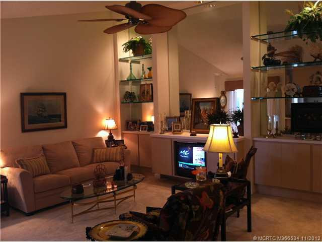 Living Room. living dining space has the signature divosta wall unit providing terrific storage and beauty