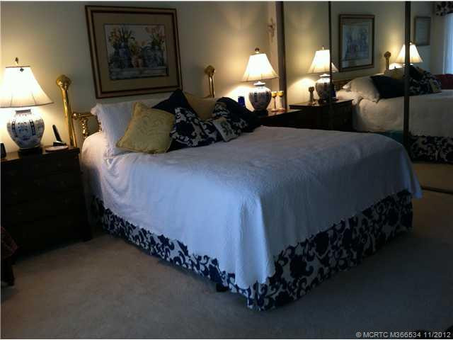 Master Bedroom. Master bedroom suite with full wall closet and sliders out to patio area