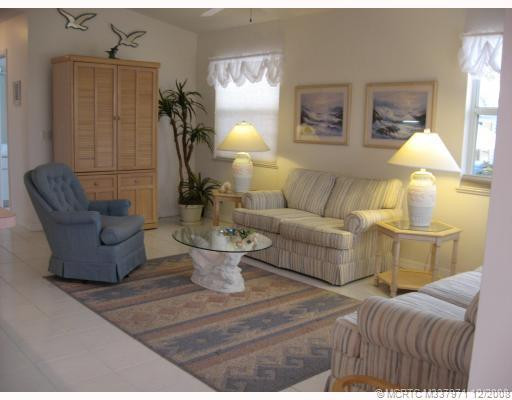 Living Room. A view of spacious living room-lots of windows side & front