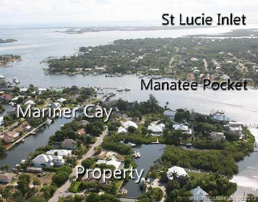 Aerial View. Perfectly situated on a protected canal with immediate access to open water