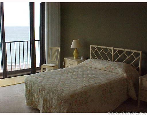 Master Bedroom. Master bedroom with sliders to oceanfront view