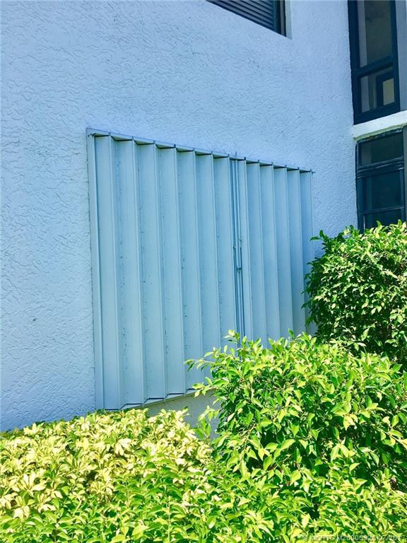 ACCORDION HURRICANE SHUTTER PROTECTION