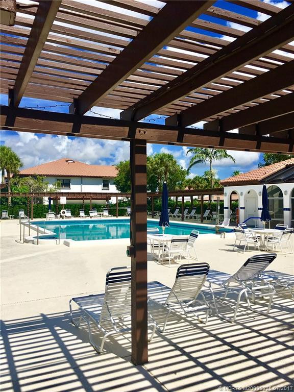 LARGE HEATED POOL AND CLUBHOUSE WITH BBQ GRILLS AND ROOM TO ENTERTAIN WITH FRIENDS