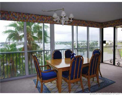 Dining Room. PANORAMIC VISTAS FROM THE SUNRISE TO AN INCREIDBLE FLORIDA SUNSETS ARE SEEN HERE! EXTRA FORMAL DINING ALLOWS FOR EVEN MORE EXPANSIVE SPACE IF NEED BE.