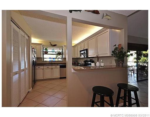 Kitchen. Upgraded Cabinets, Stainless Steel Appliances, and Granite Countertops make this condo stand out far above the rest!