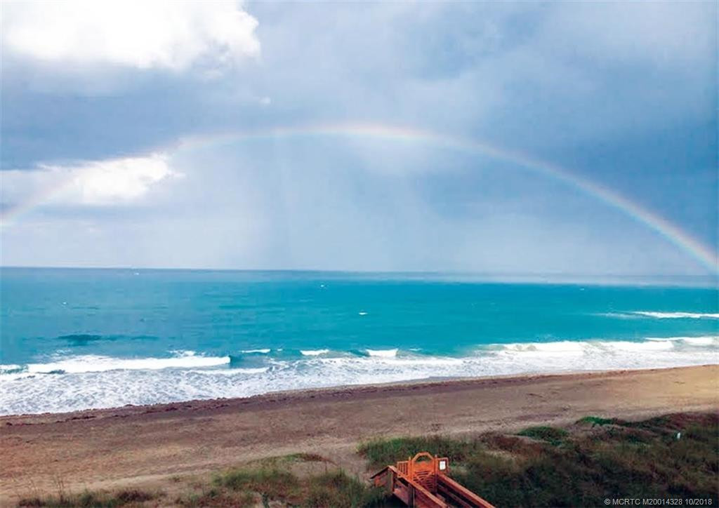 Rainbow Over the Ocean off Suntide's Beach