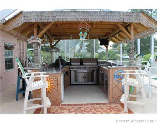 Other. summer kitchen tiki area