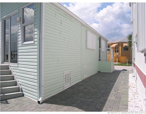 Other. Rear porch, pavered area and side courtyard entrance