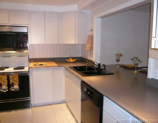 Kitchen. Black & White Decor in updated Kitchen with lots of storage