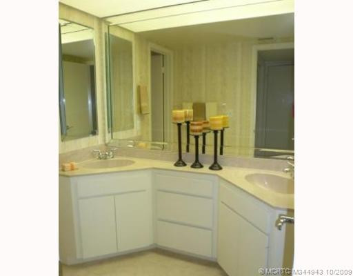 Master Bath/Spa. Dual sink cultured marble vanity and soft neutral tones in updated master bath