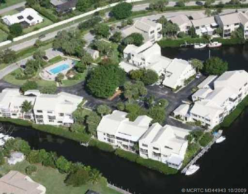 Aerial View. Condo #4 is located on waterway opposite swimming pool