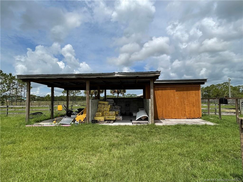 Hay storage shed with additional storage