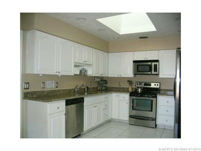 Kitchen. Kitchen has stainless steel appliances and granite tops
