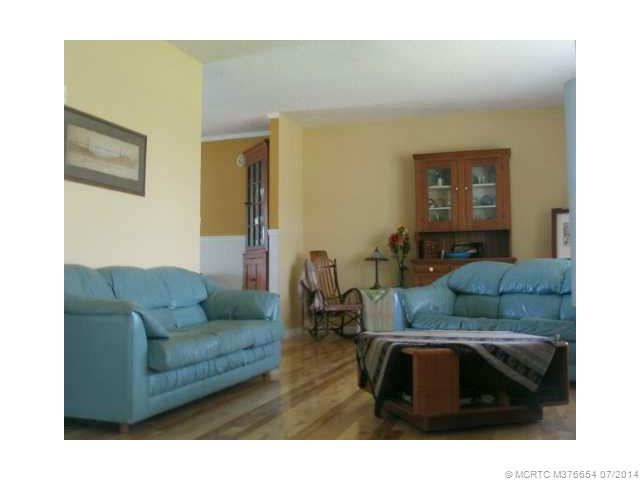 Living Room. Sunken living room with wood floors