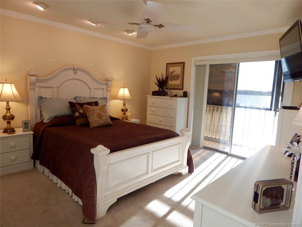Master Bedroom and Wrap-Around Lanai with amazing views of River