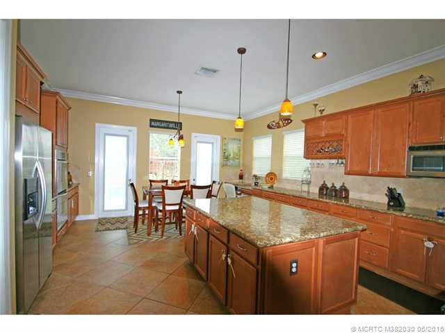 Exterior Front. Over sized kitchen with large center island and breakfast nook.
