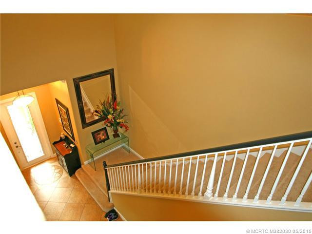 Exterior Front. Open stairs with dramatic entrance to the upper floor