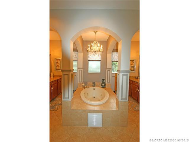 Exterior Front. The jetted tub is the focal point of this spa inspired master bath