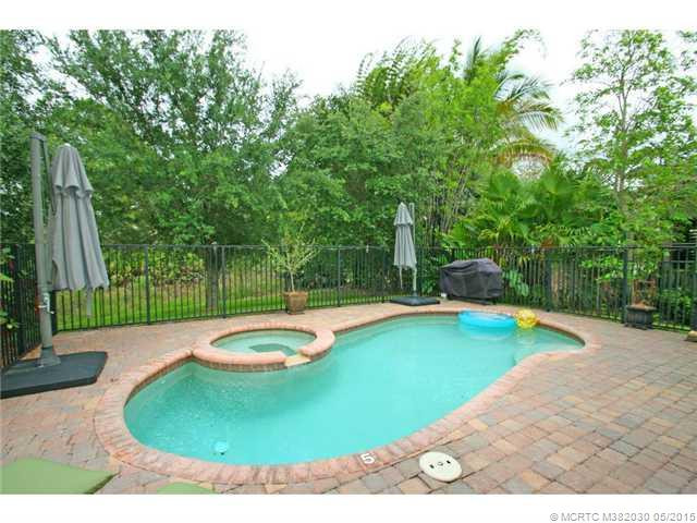 Exterior Front. Pool and spa are an inviting place to relax and enjoy the natural preserve