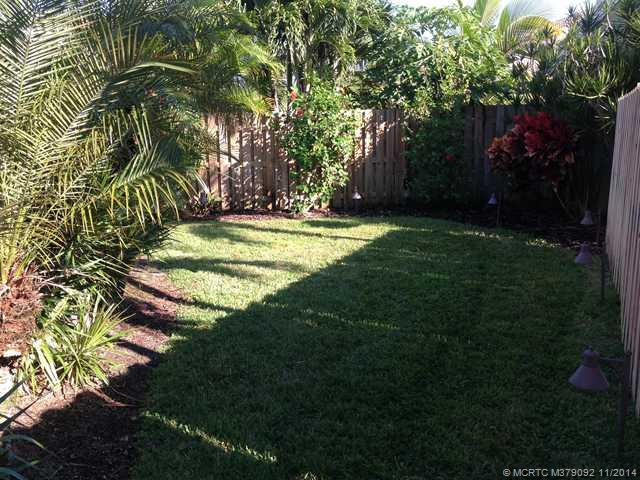 Yard/Garden. Fenced yard with outdoor lighting