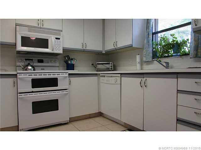 Kitchen. Light and Bright Kitchen with window looking out into courtyard