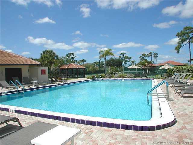 Swimming Pool/Hot Tub/Sauna. Large and inviting community pool with plenty of seating and lounge chairs to relax