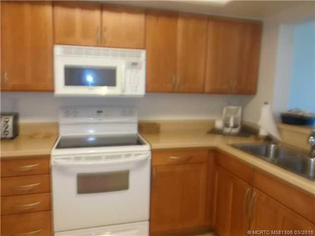 Kitchen. UPDATED CABINETS WITH FLAT TOP STOVE
