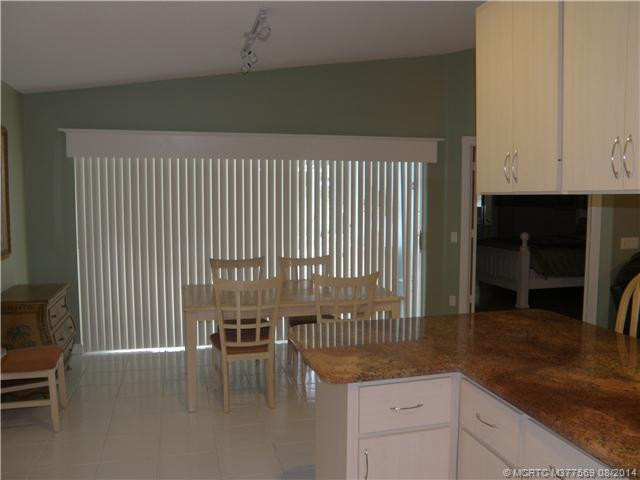 Dining Room. from near the refrigerator looking toward back patio