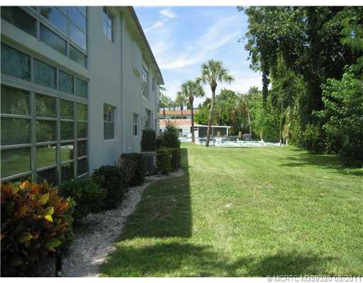 Exterior Back. Just a short walk to the pool, clubhouse and shuffleboard court