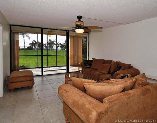 Living Room. Living room with a view thru the Florida room to the River. Beautiful Sunsets