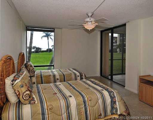 Master Bedroom. Master has sliders to patio and view of the River