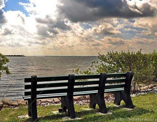 Exterior Front. Nice view of the Indian River right outside your Living Room or either Bedroom