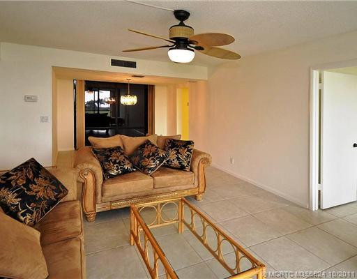 Exterior Front. Living room with the dining room behind