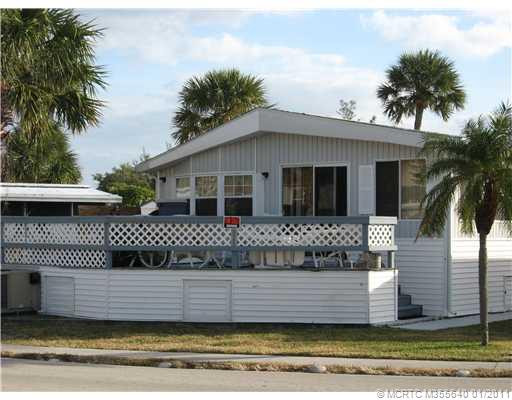 Exterior Back. A WONDERFUL LARGE DECK TO ENJOY AT THE BACK.