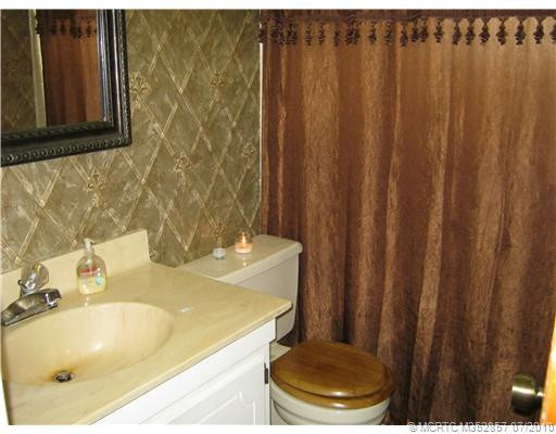 Other. Guest Bathroom situated in hallway leading to the guest bedroom