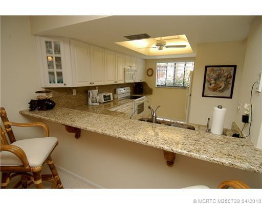 Kitchen. Gorgeous Granite countertops, backsplash. White cabintes with pull-outs. Pantry.