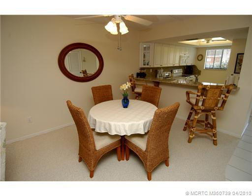 Dining Room. Looking into the kitchen. The Granite breakfast bar makes for easy serving with guests, or for additional seating.