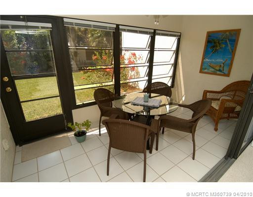 Den/Family/Great Room. Florida room, or glass-enclosed screen porch with door exiting to the outdoors & garden area.