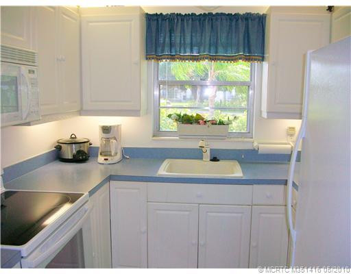 Kitchen. Smooth top stove, built-in Microwave, Fridge w/bottom freezer