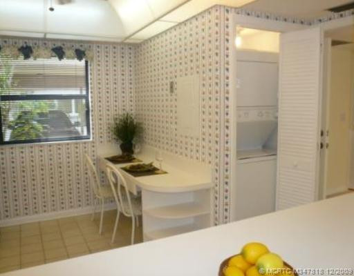 Kitchen. Stack washer/dryer is conveniently located in Eat-In Kitchen