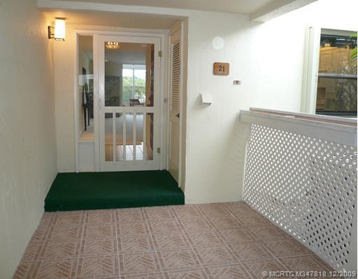 Exterior Front. Front Entry has been upgraded with pavers. Screen door allows cross breeze from windows on water