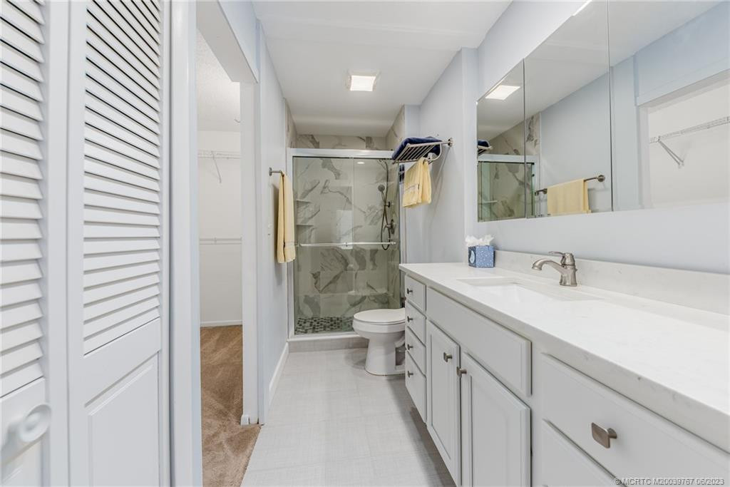 Master bath with its easy access shower and loads of storage