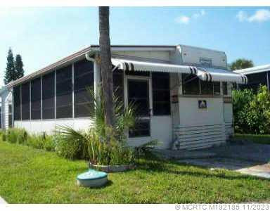 Property photo for 873 Nettles Boulevard 873, Jensen Beach, FL 34957