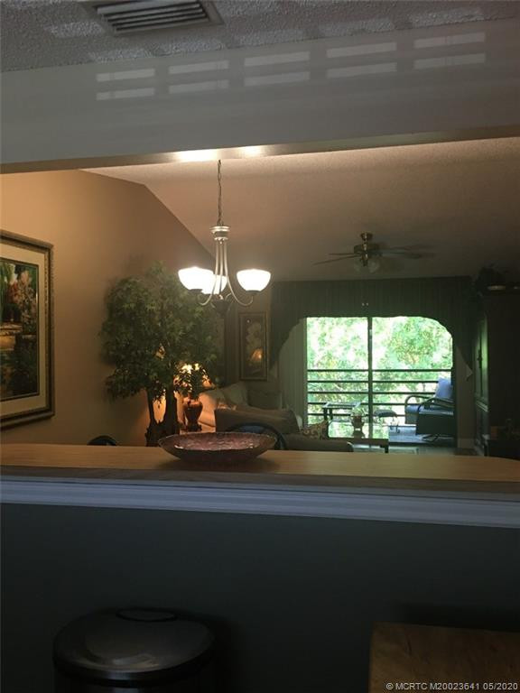 Pass-thru from kitchen to dining/living area.