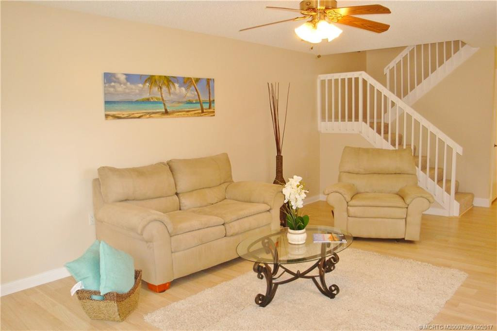 Living Room & stairwell to upstairs bedrooms.