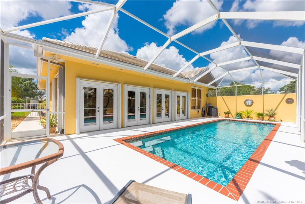 Imagine enjoying your morning coffee on the lovely patio while gazing at the pool & tropical grounds.