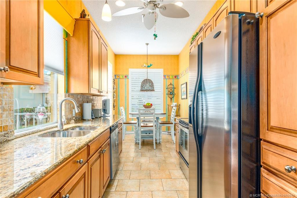 For the Chef in the family a gleaming granite kitchen! High end custom cabinetry, newer s/s appliances, lighting, paint & tile floors.