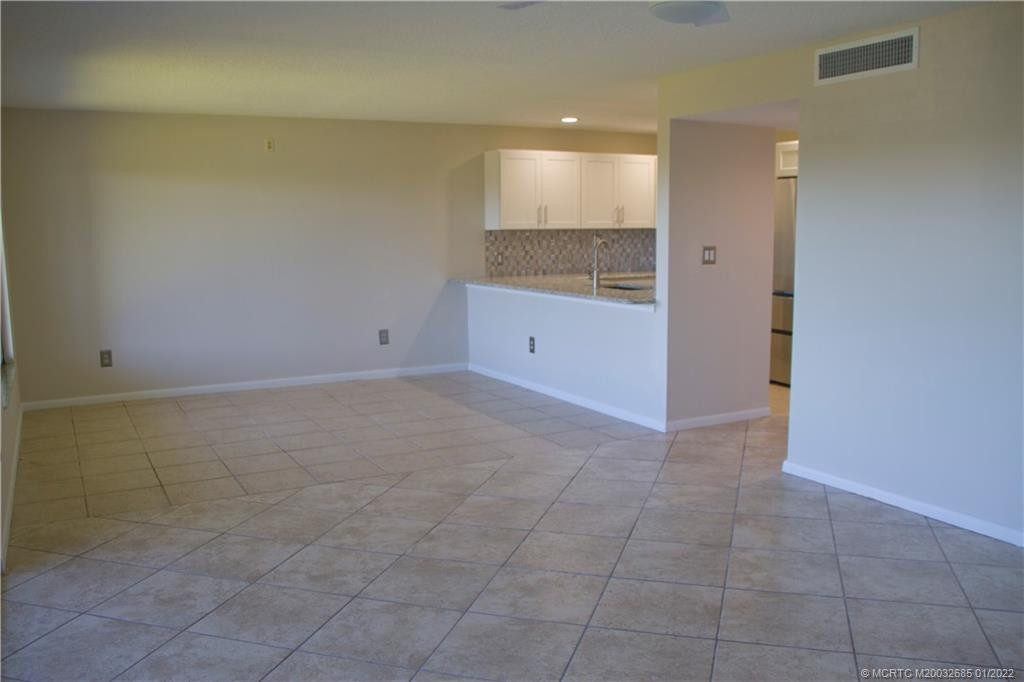 Open concept living area is bright and cheerful