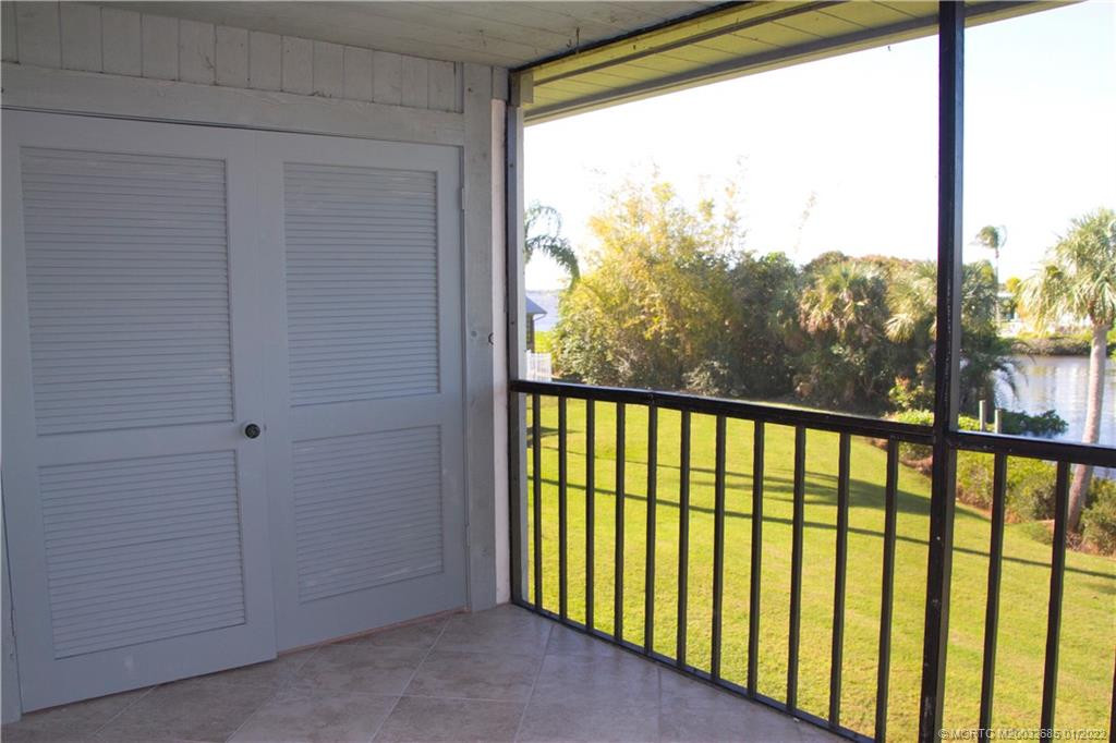Storage closets on screened porch